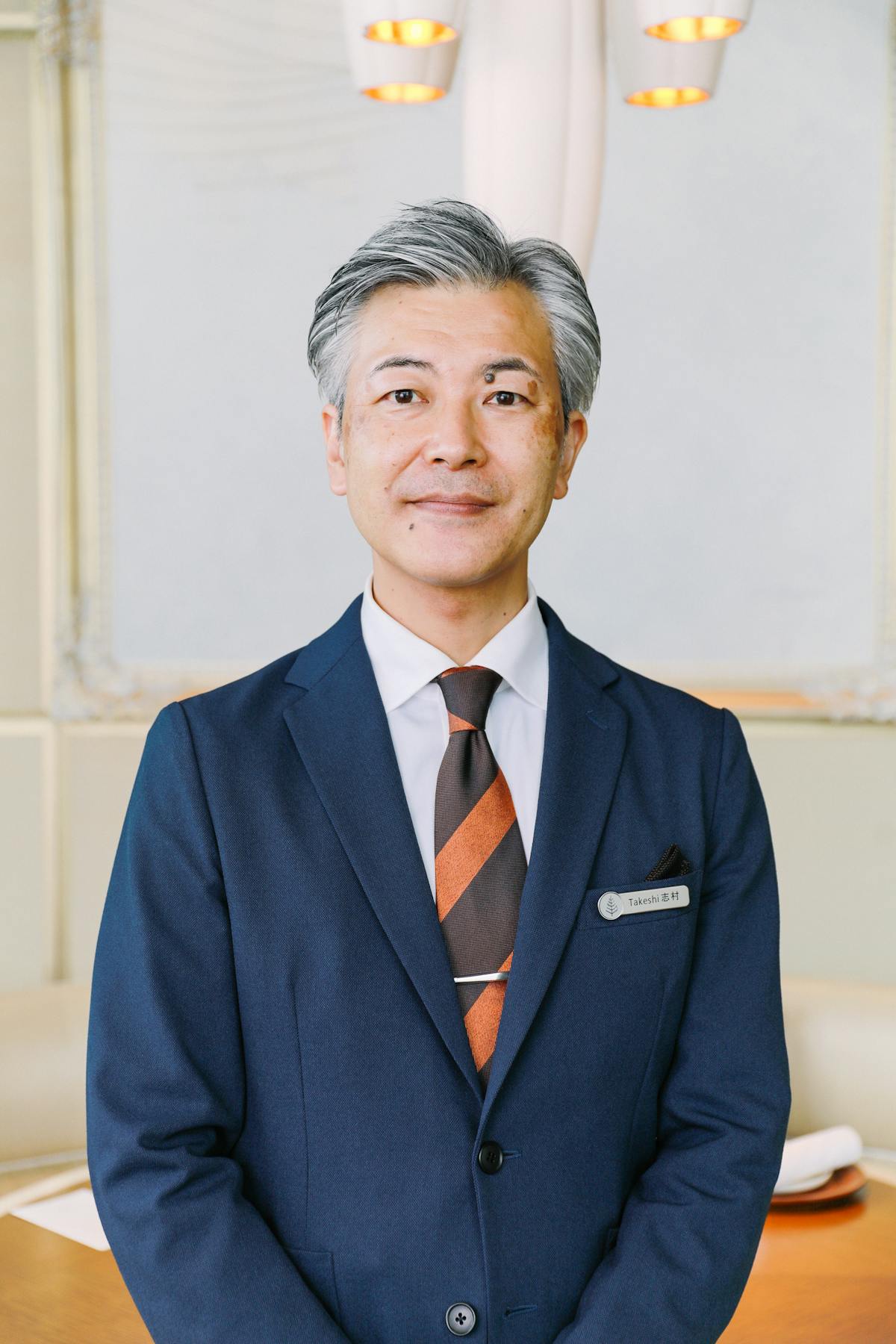 a man wearing a suit and tie