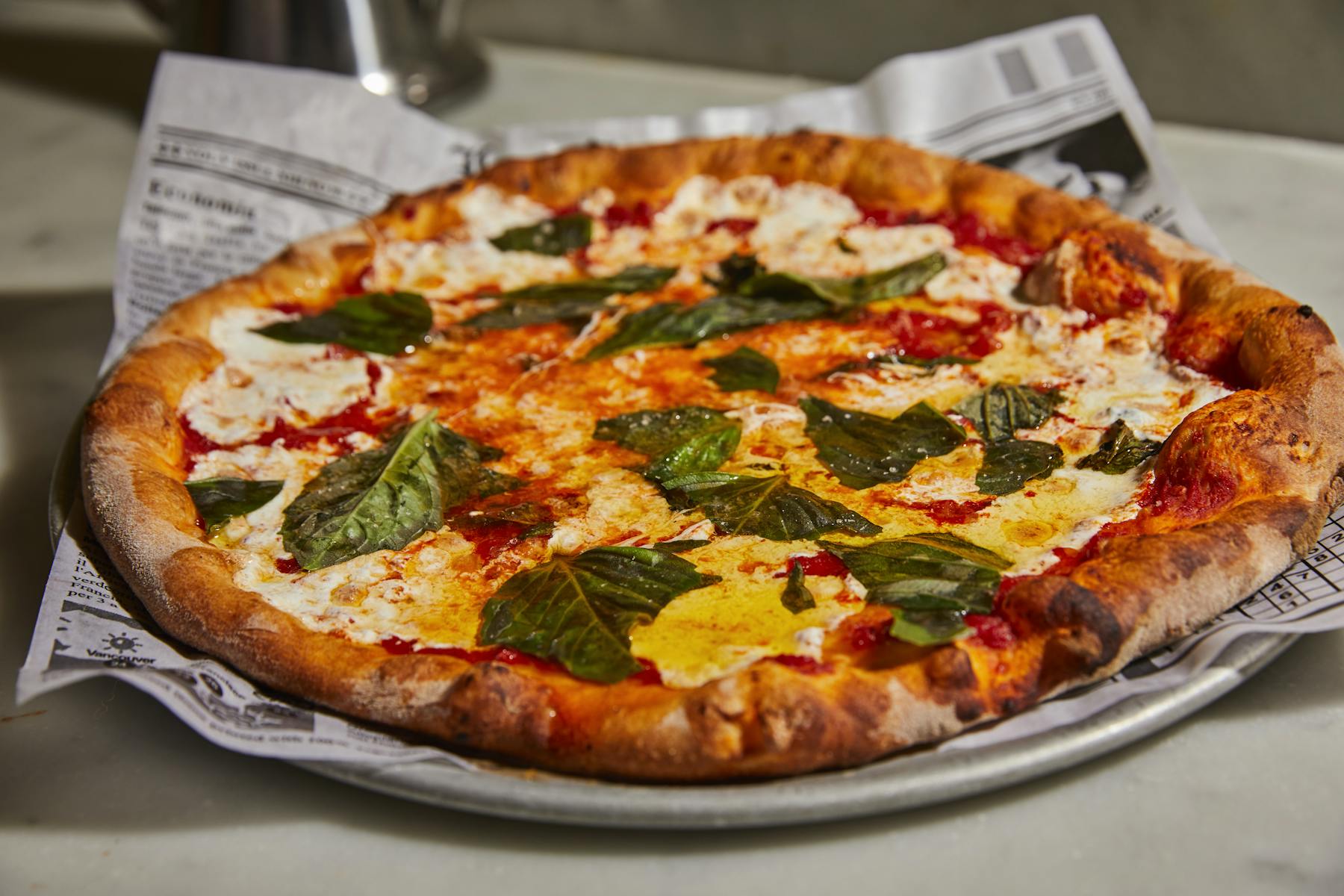 a pizza sitting on top of a table