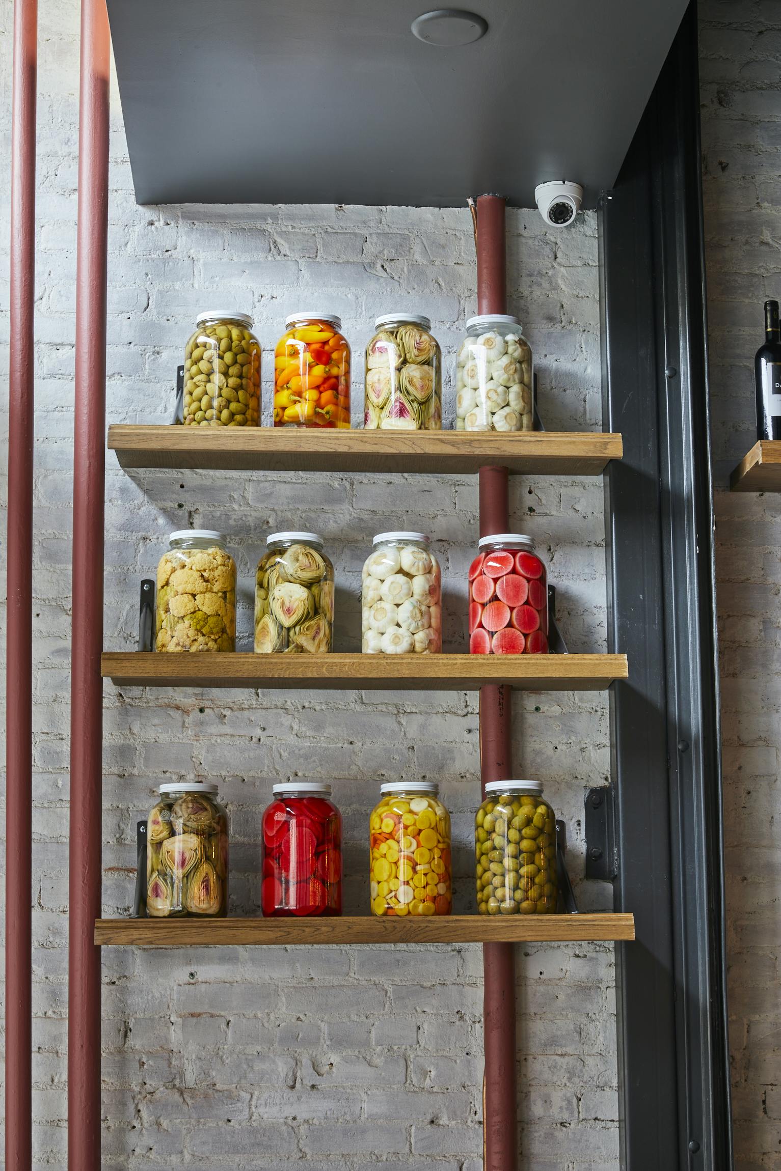 a close up of a bottle and a glass display case