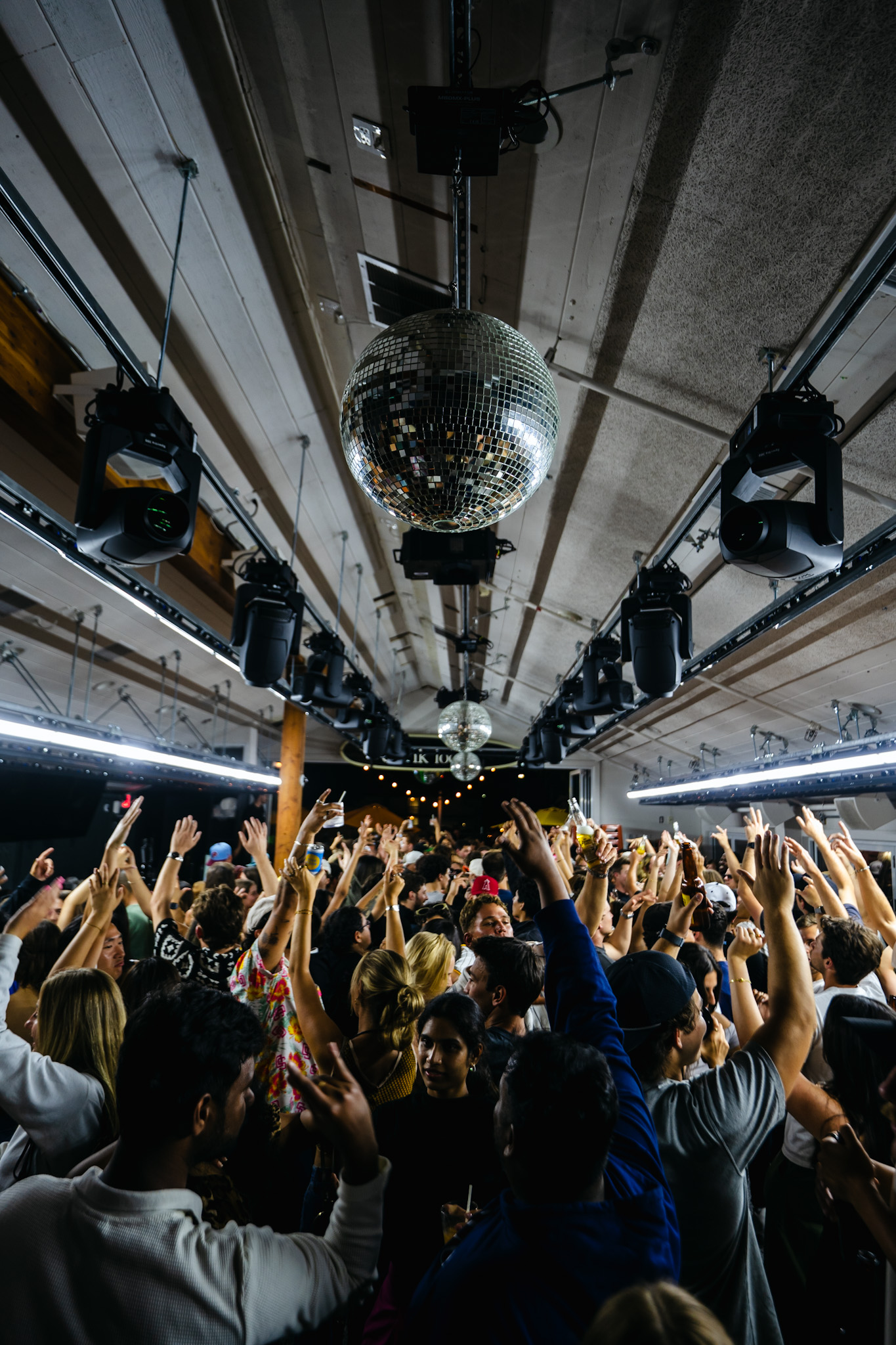 a group of people standing in front of a crowd