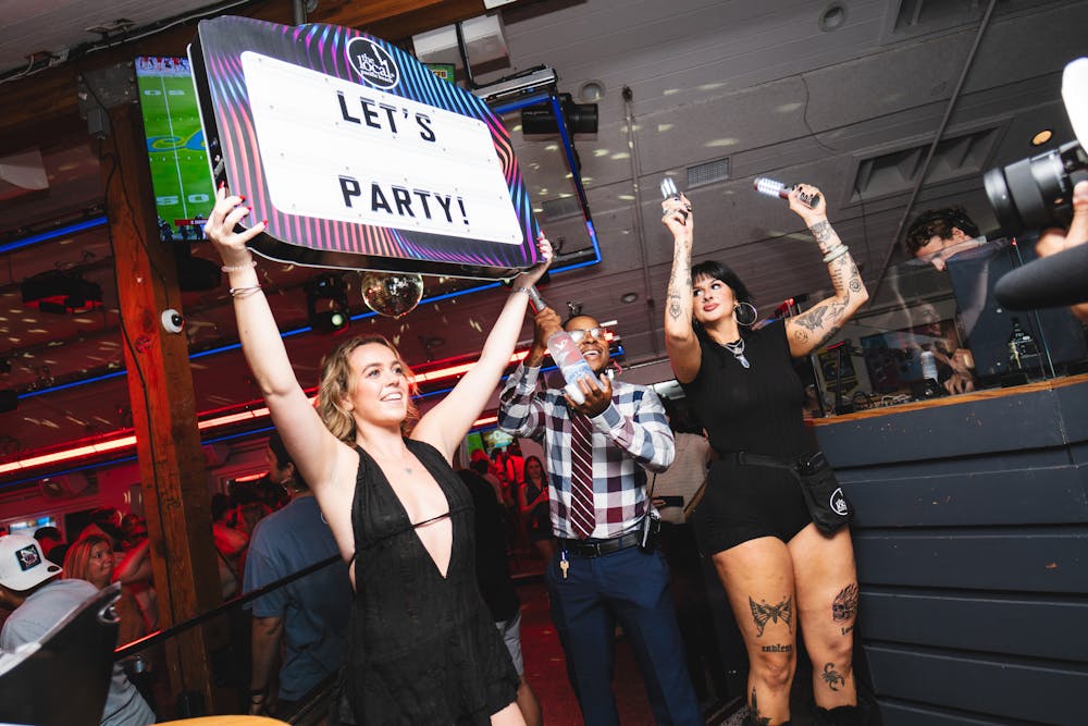 a group of people posing for the camera