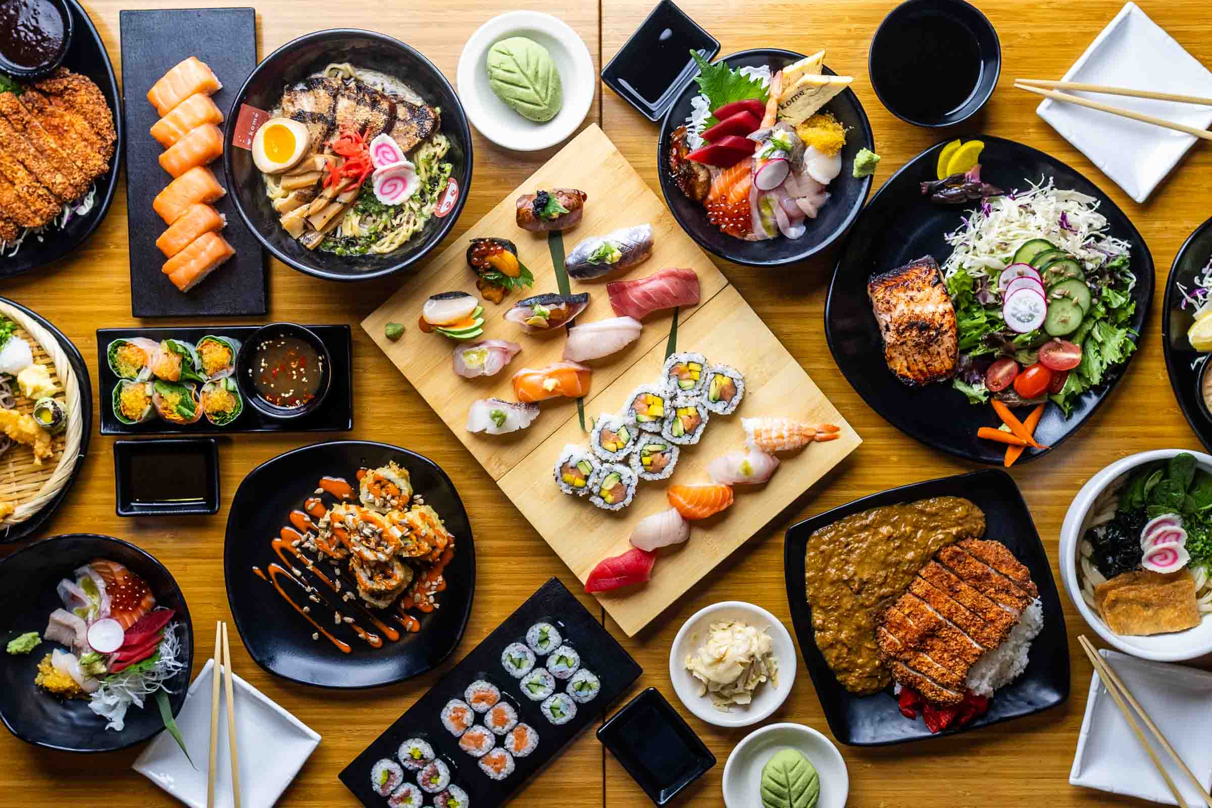 a bunch of different types of food on a table