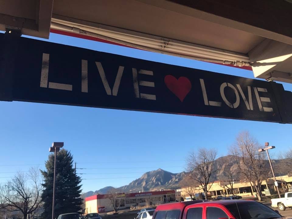 A sign above the front door that says