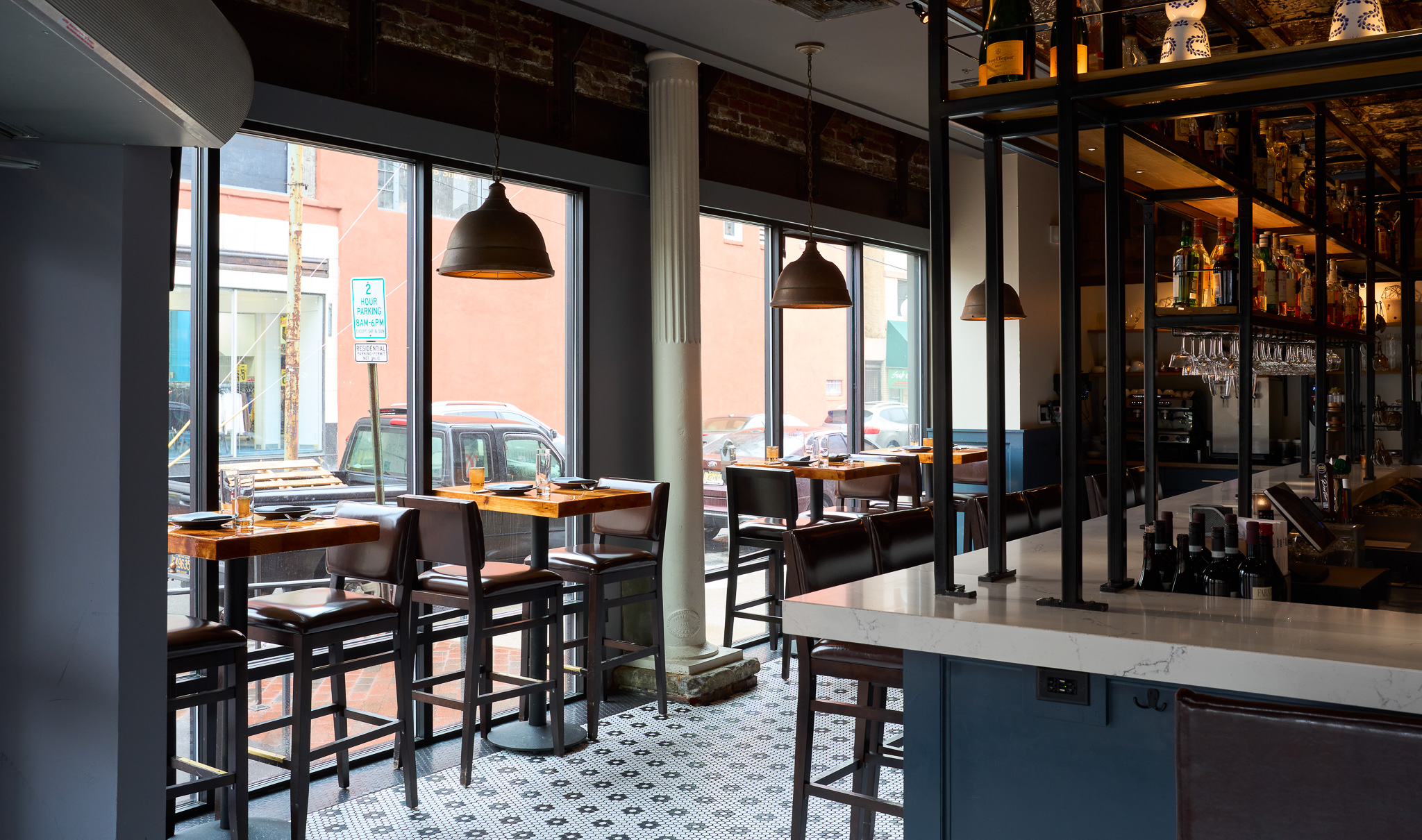 a dining room table in front of a window