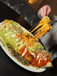 a slice of pizza on a plate