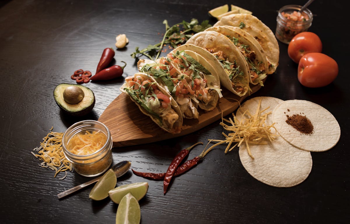 a plate of food on a table for taco and tequila tuesday
