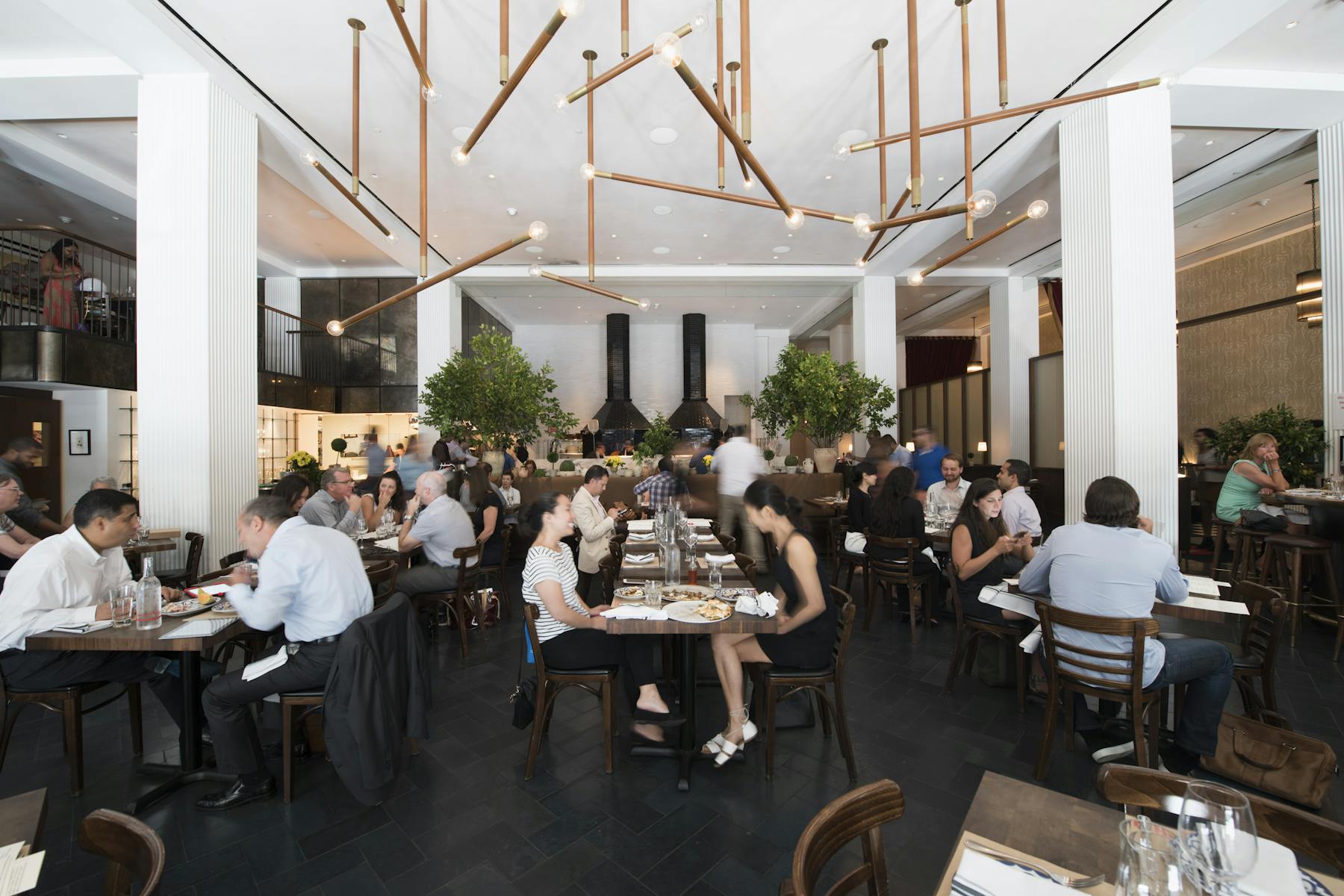 a group of people sitting at a table