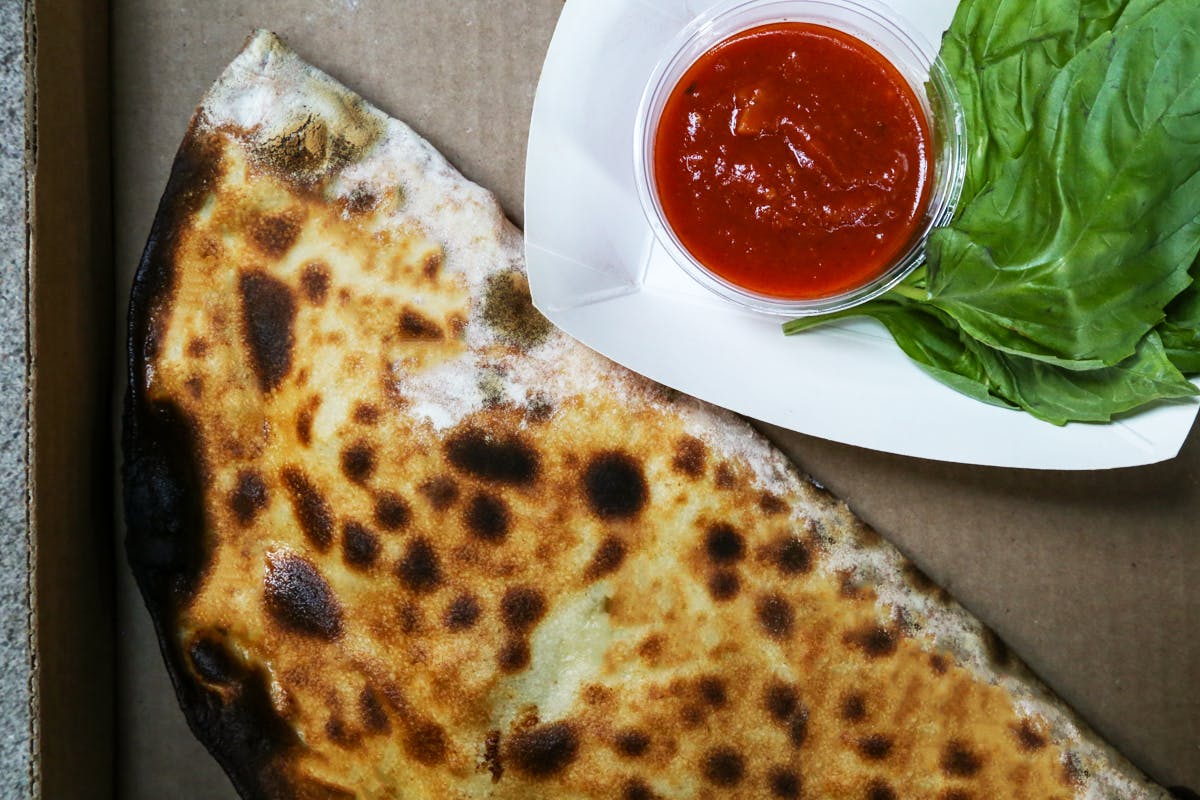 a close up of a calzone