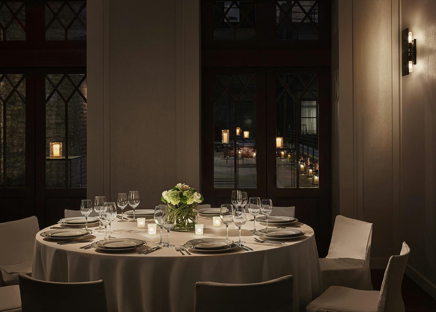 a dining table in front of a window