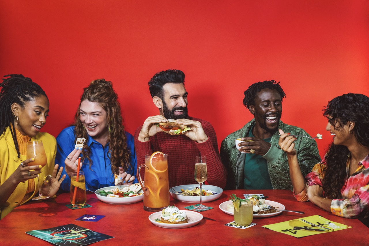 a group of people sitting at a table