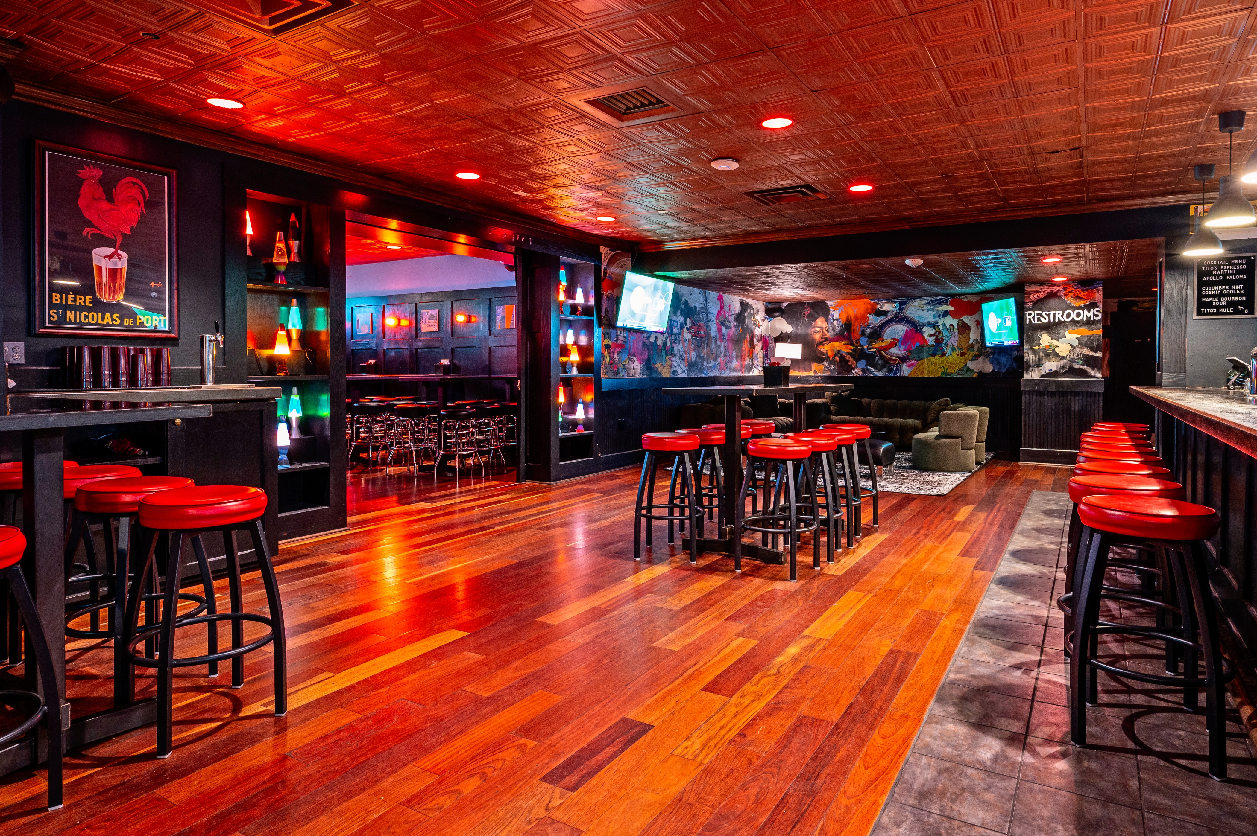 a group of people sitting at a table in a restaurant