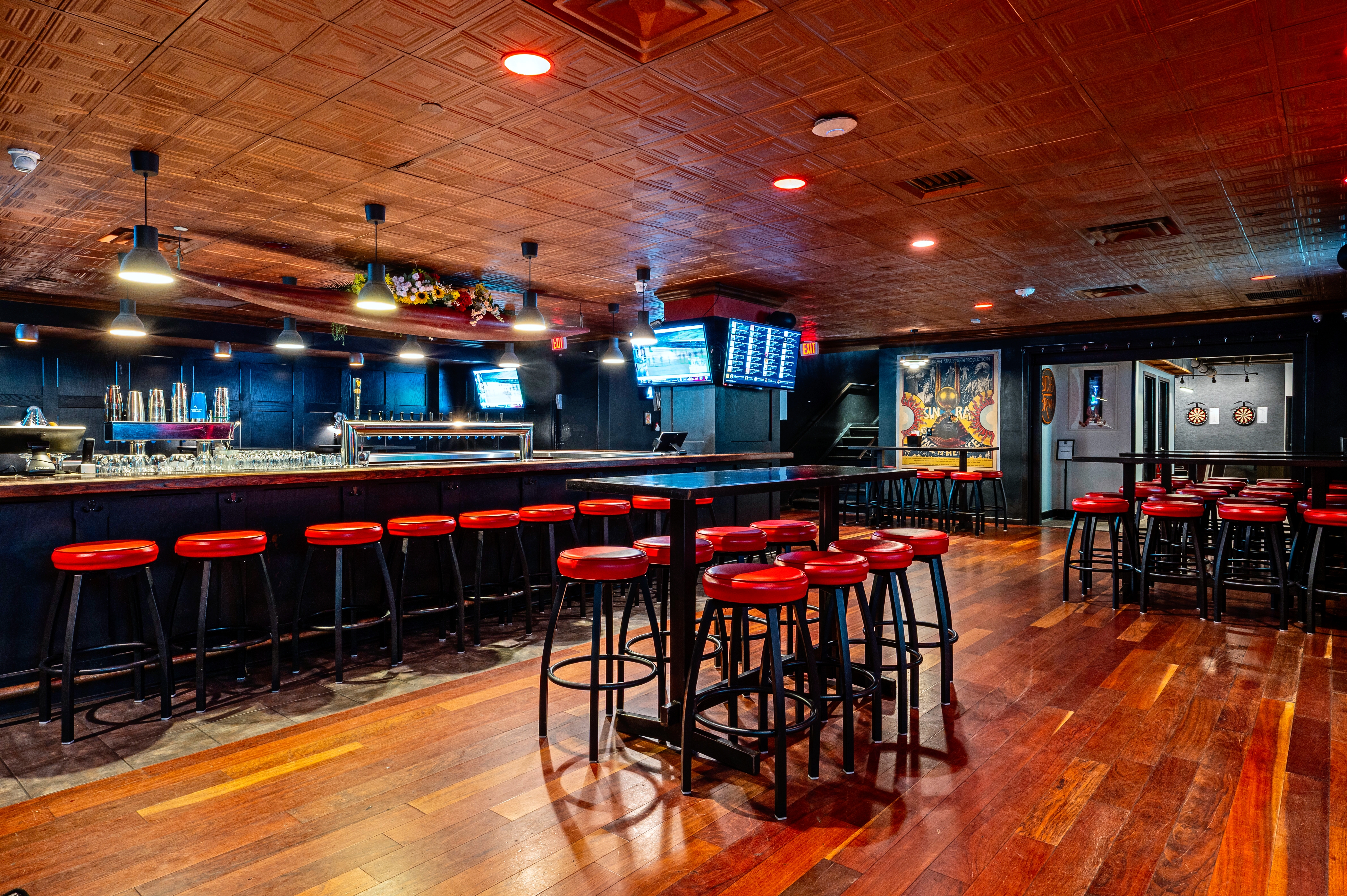 a group of people sitting at a train station