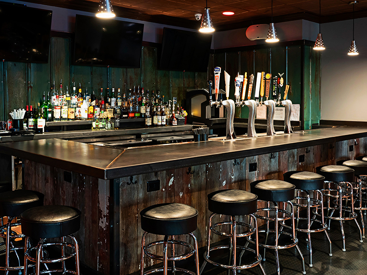 a kitchen with a table in a restaurant