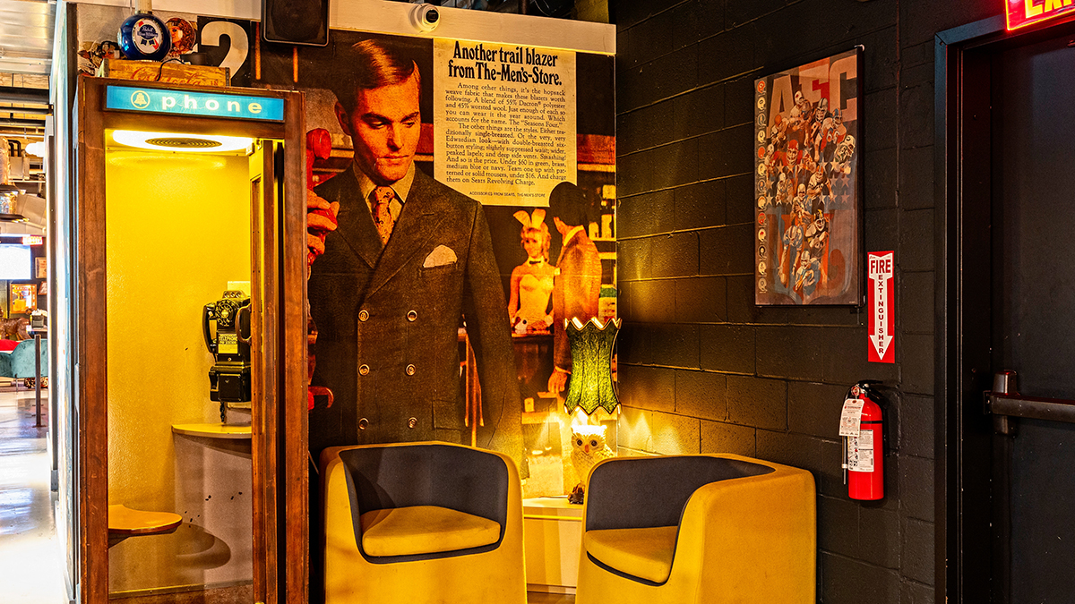 a person standing in front of a refrigerator