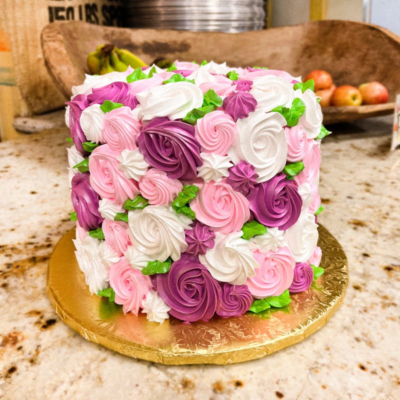 a large chocolate cake sitting on top of a table