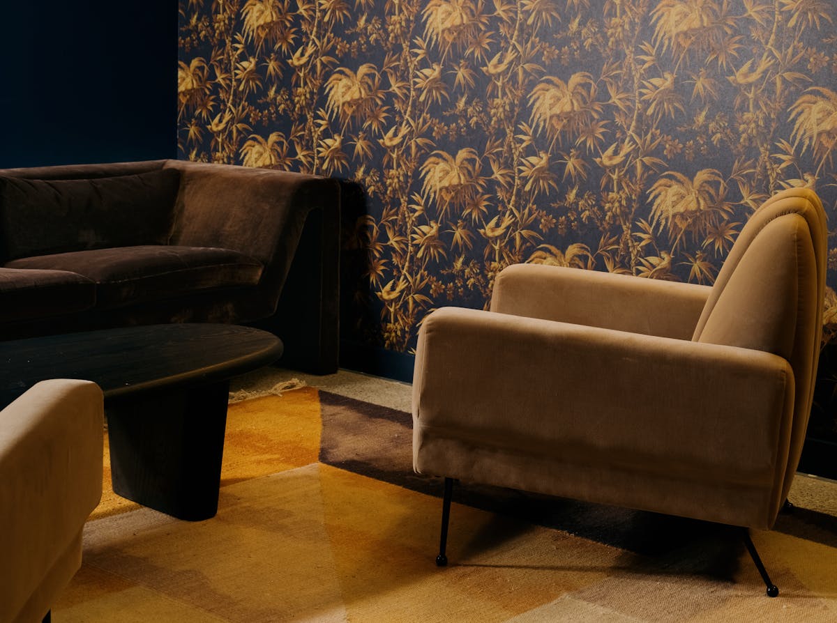 a living room with a leather chair
