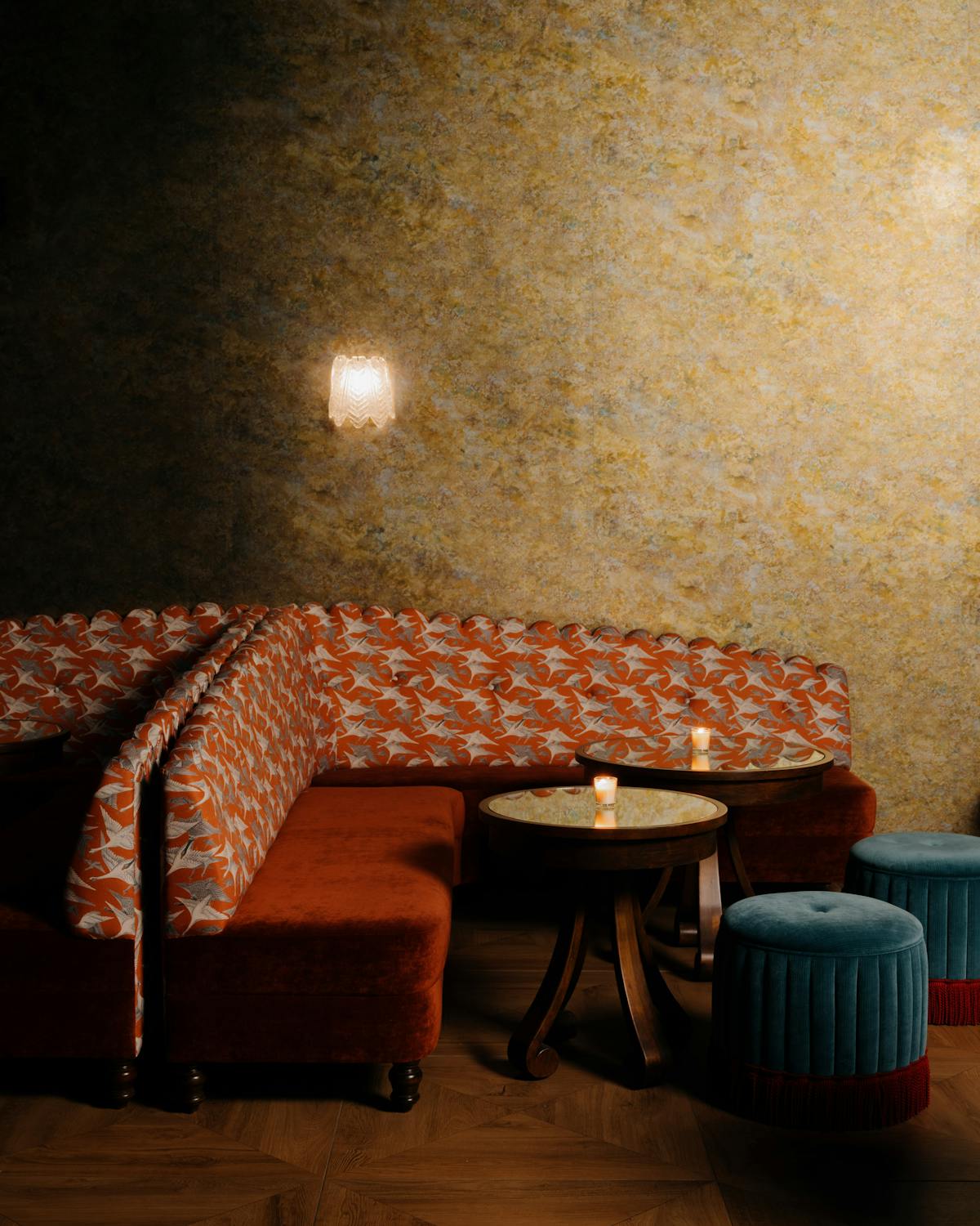 a bedroom with a bed and a chair in a room