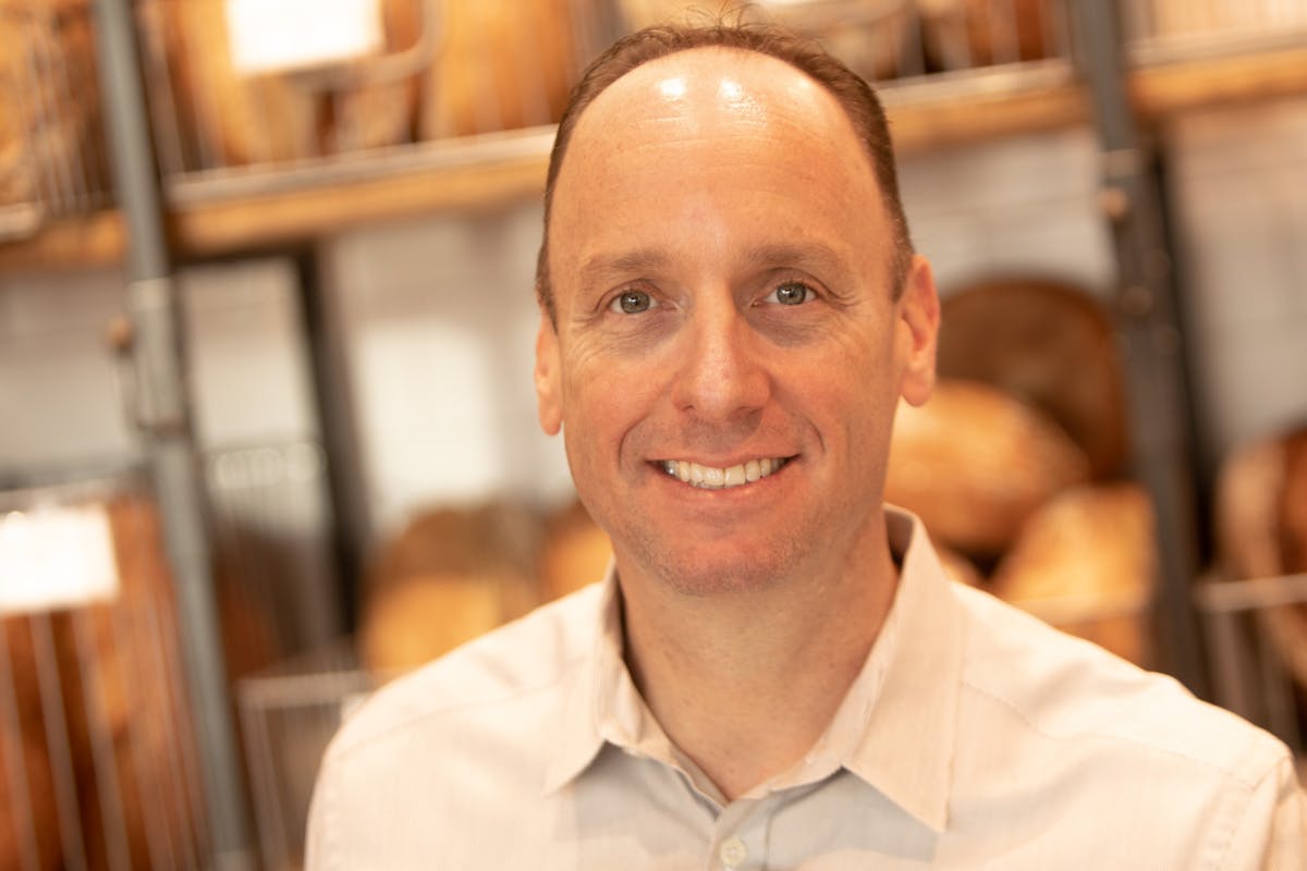 a man smiling for the camera
