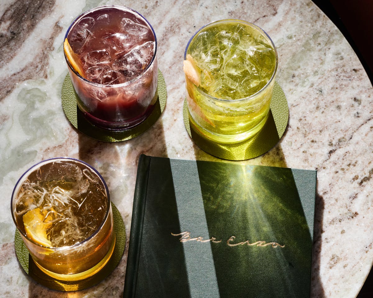 a close up of cocktails on table