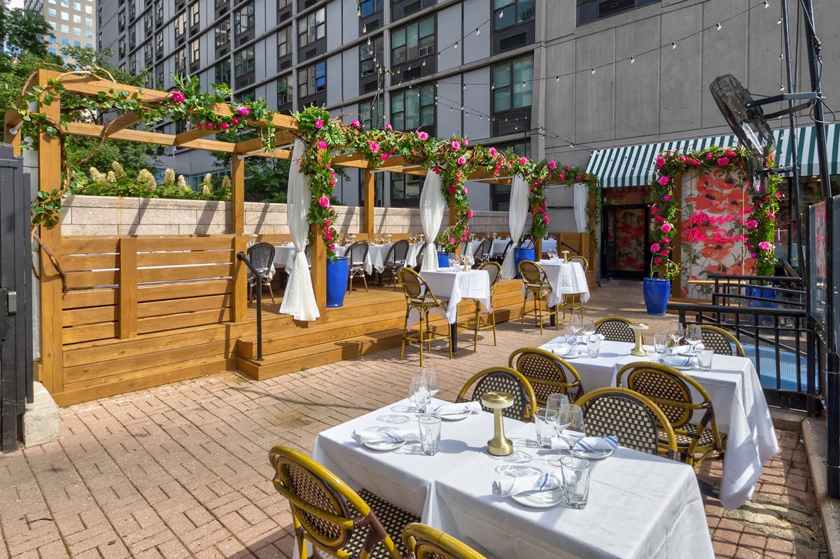 a dining room table in front of a building