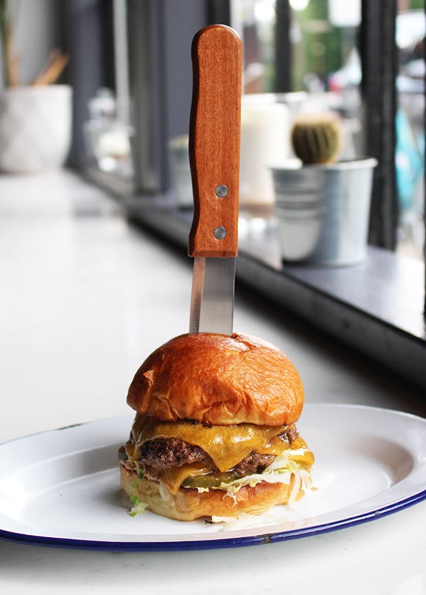 a sandwich sitting on top of a white plate
