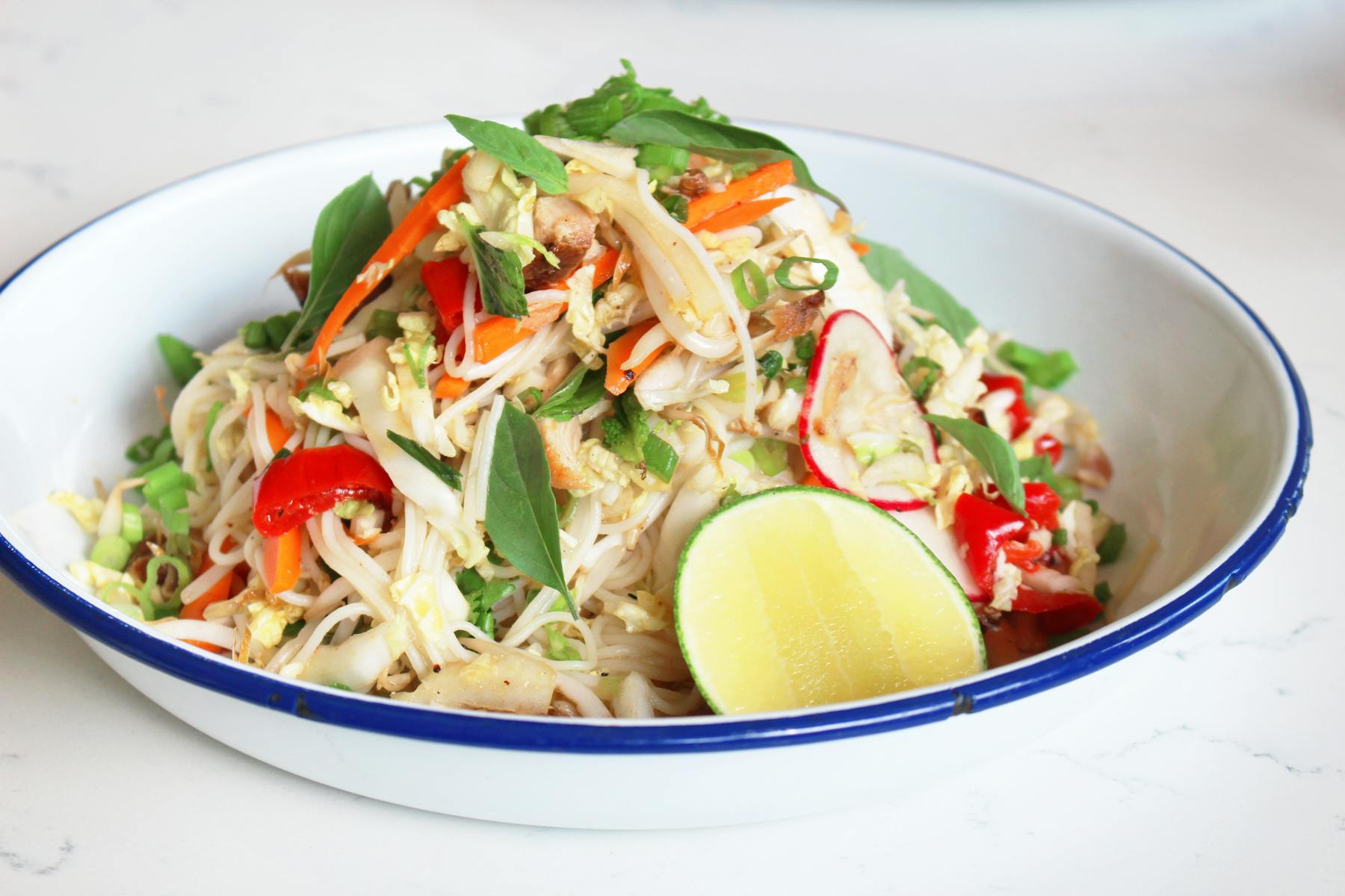 a bowl of salad on a plate