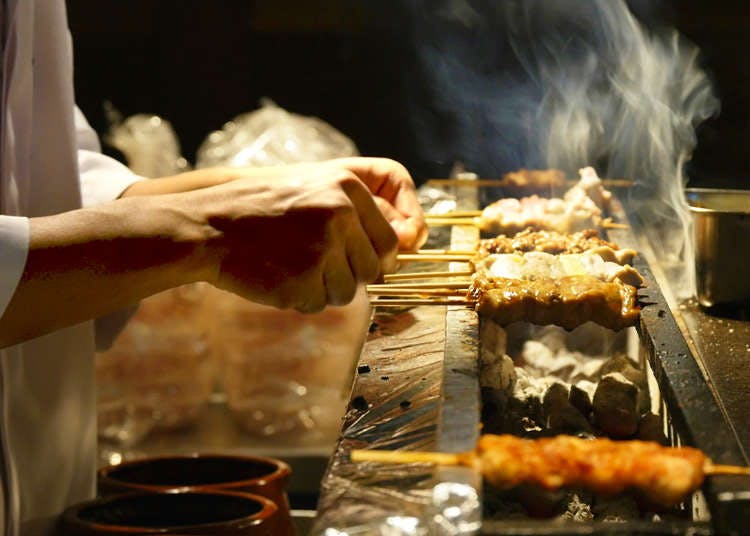 a person cooking food on a table