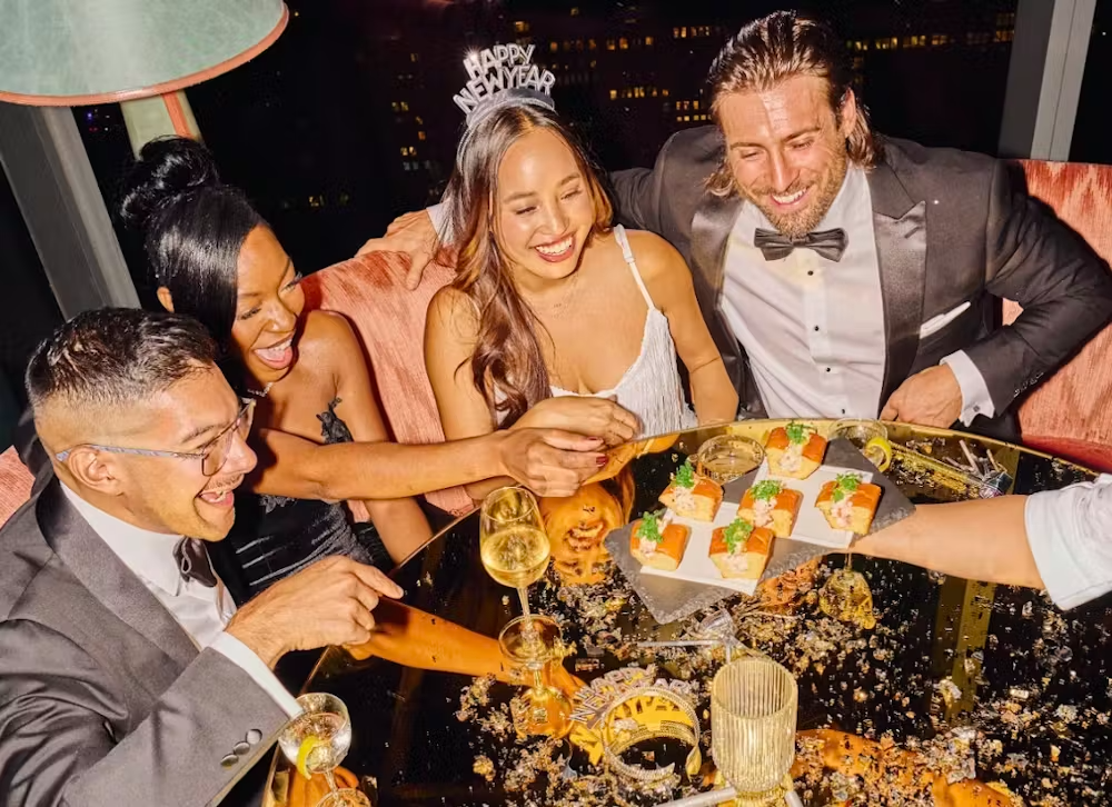 a group of people sitting at a table