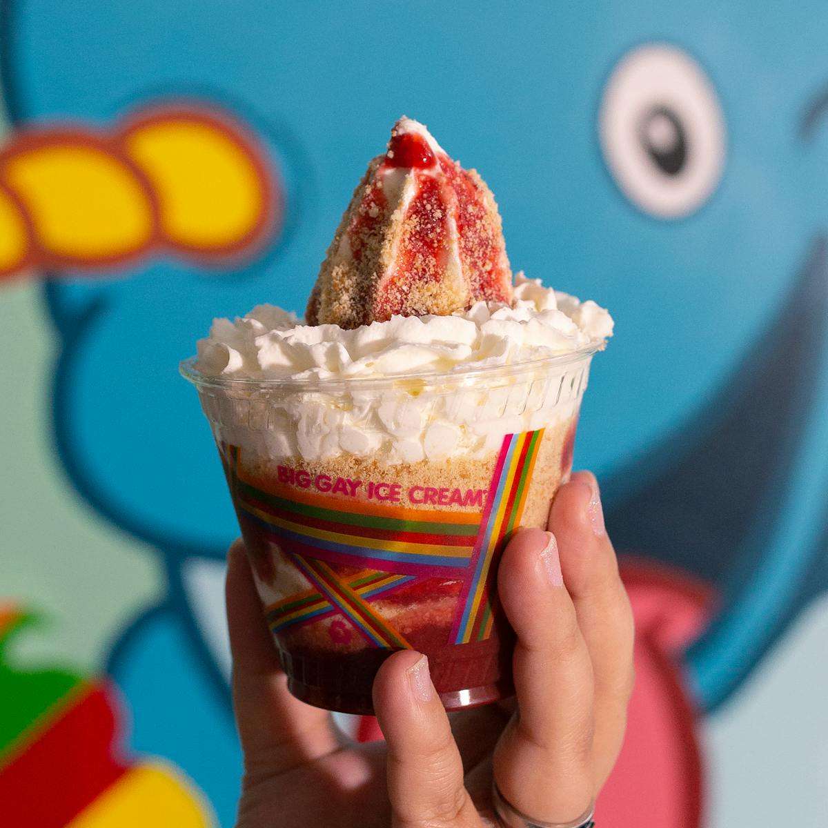 a sundae topped with whipped cream