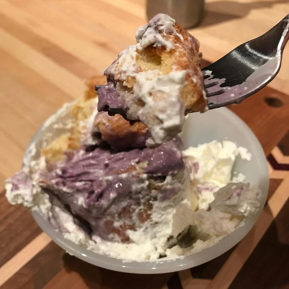 a sundae sitting on top of a wooden table