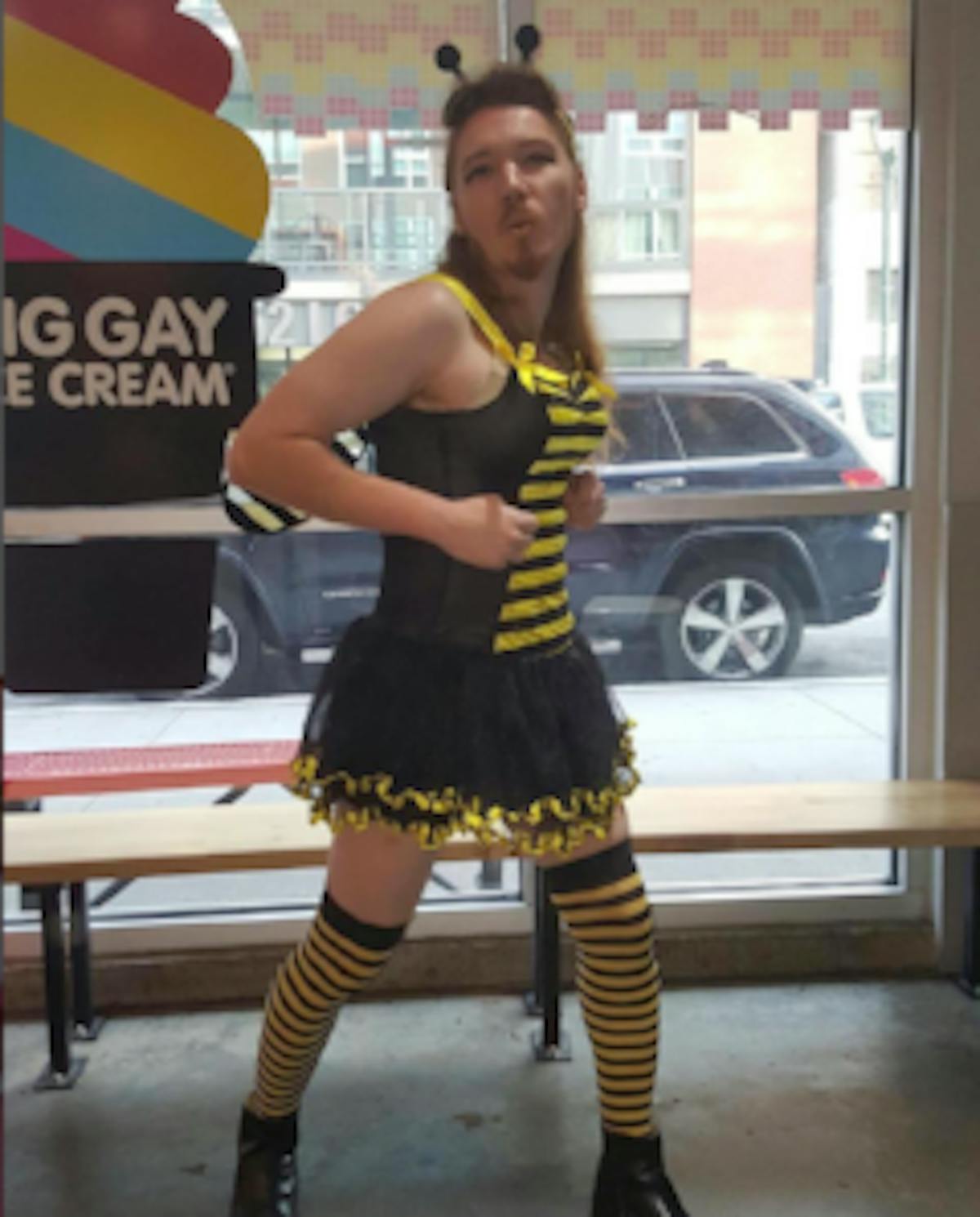 a man with a costume posing for the camera