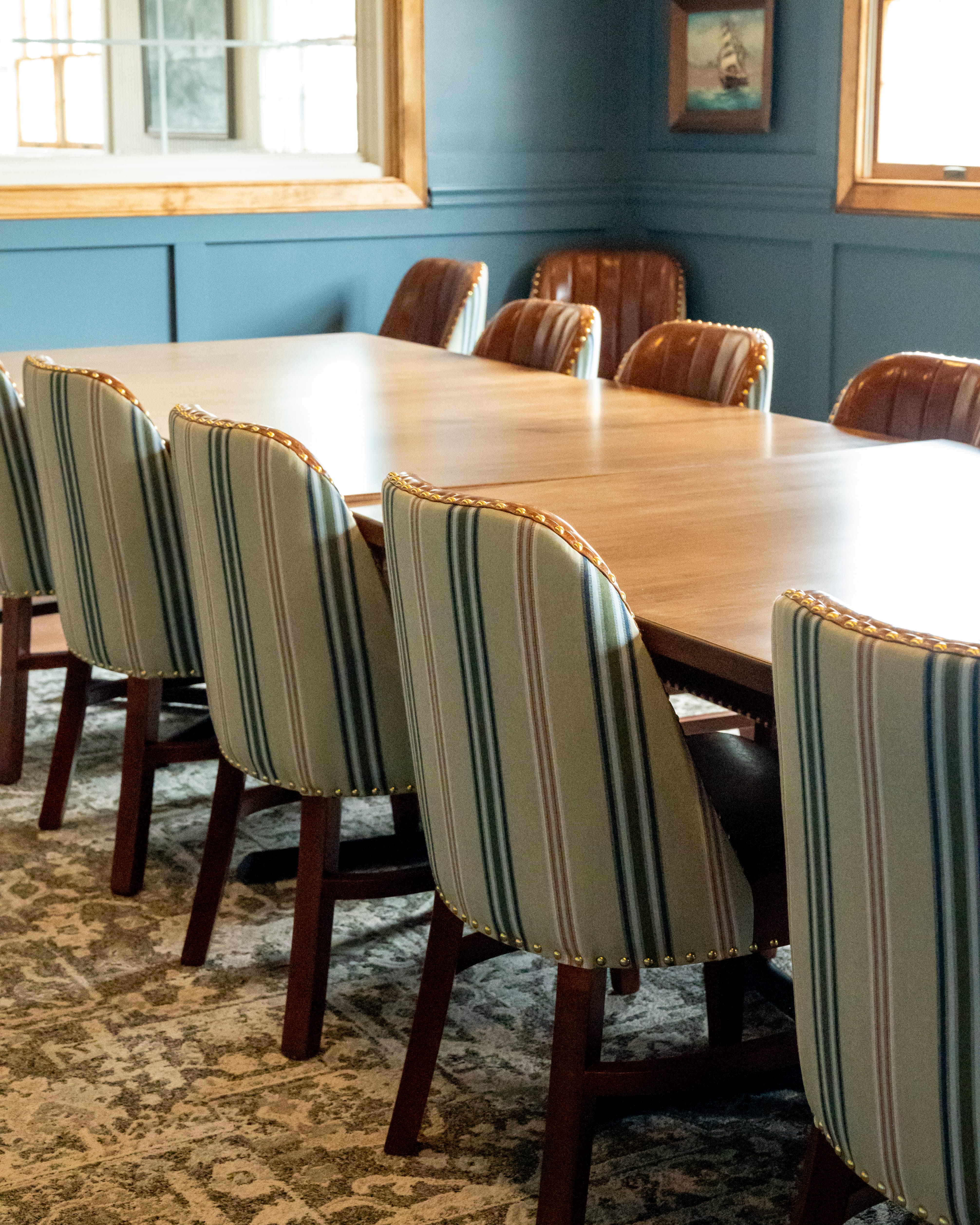 a table with chairs in a room