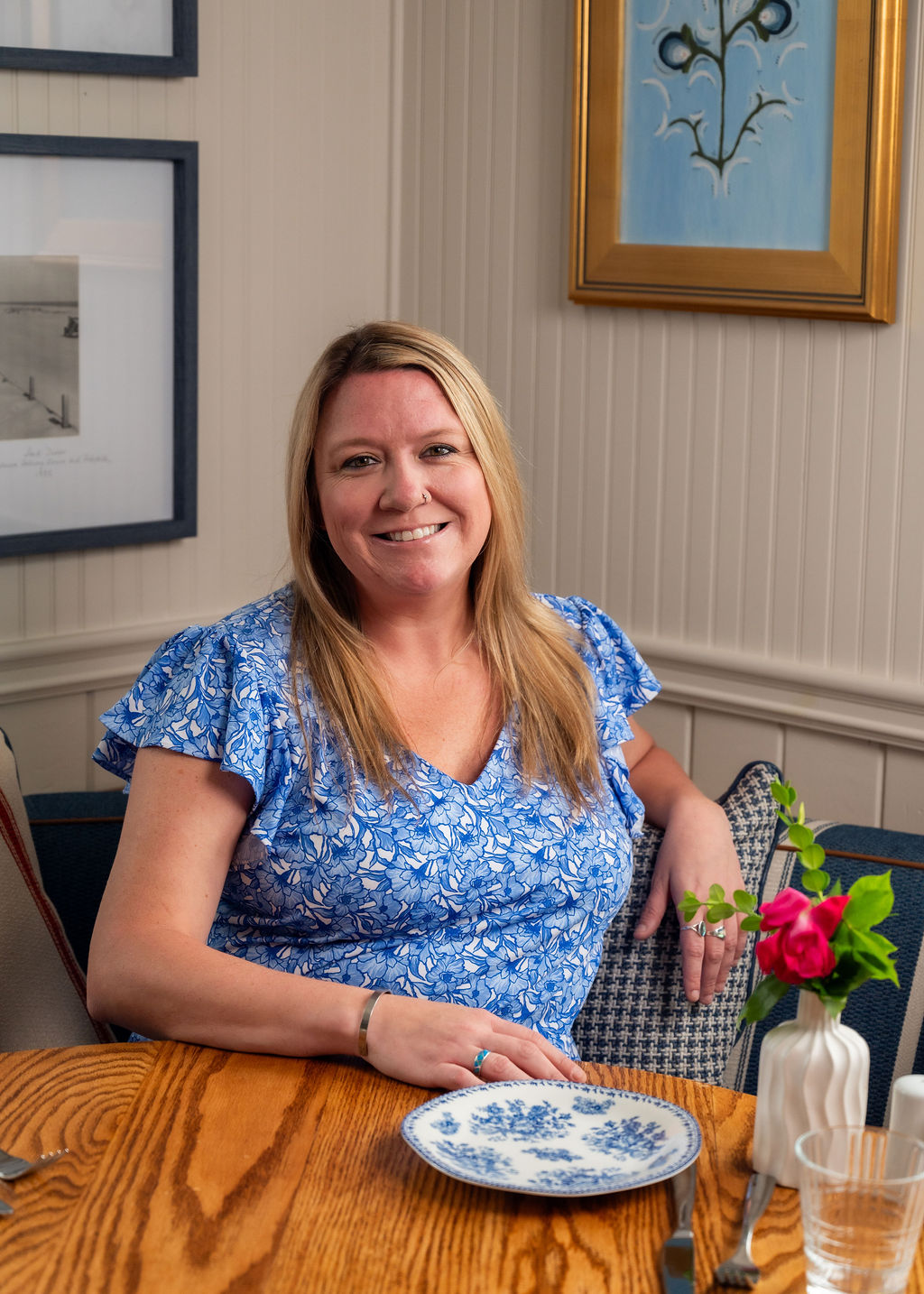 a woman sitting on a table