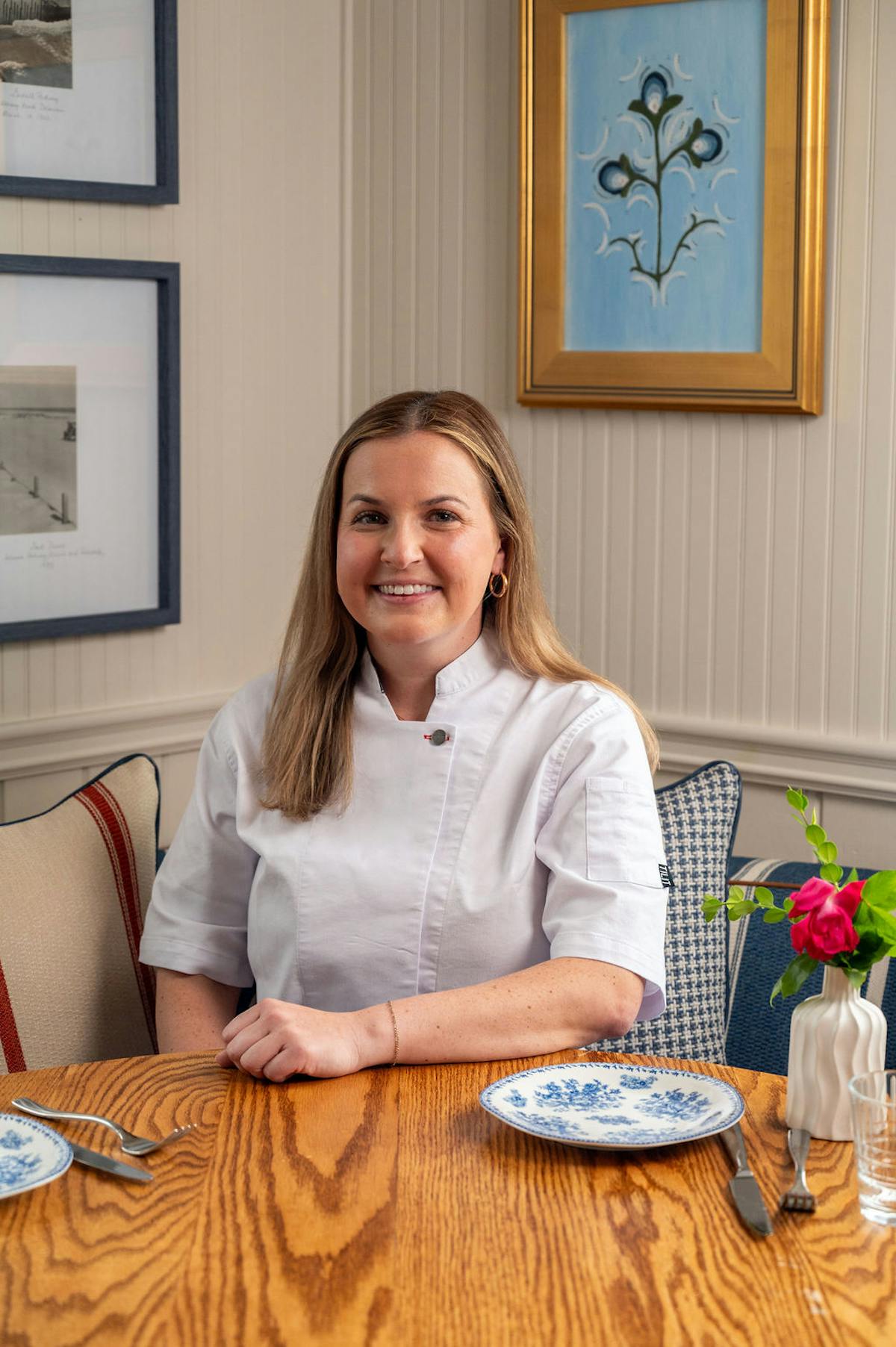 Deborah Moore sitting on a table