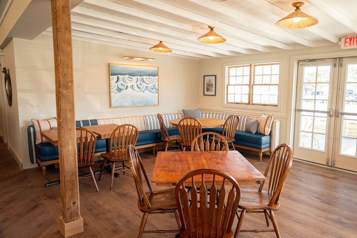 a room with tables and chairs