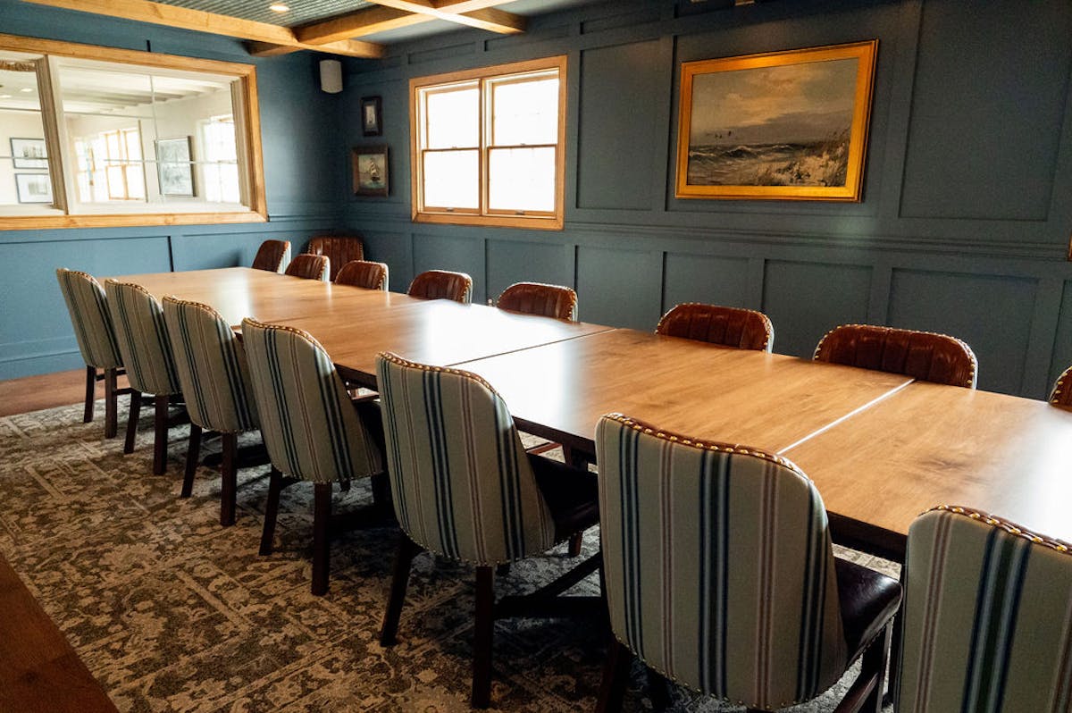 a room with tables and chairs
