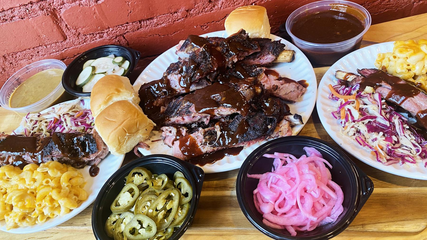 a box filled with different types of food on a plate