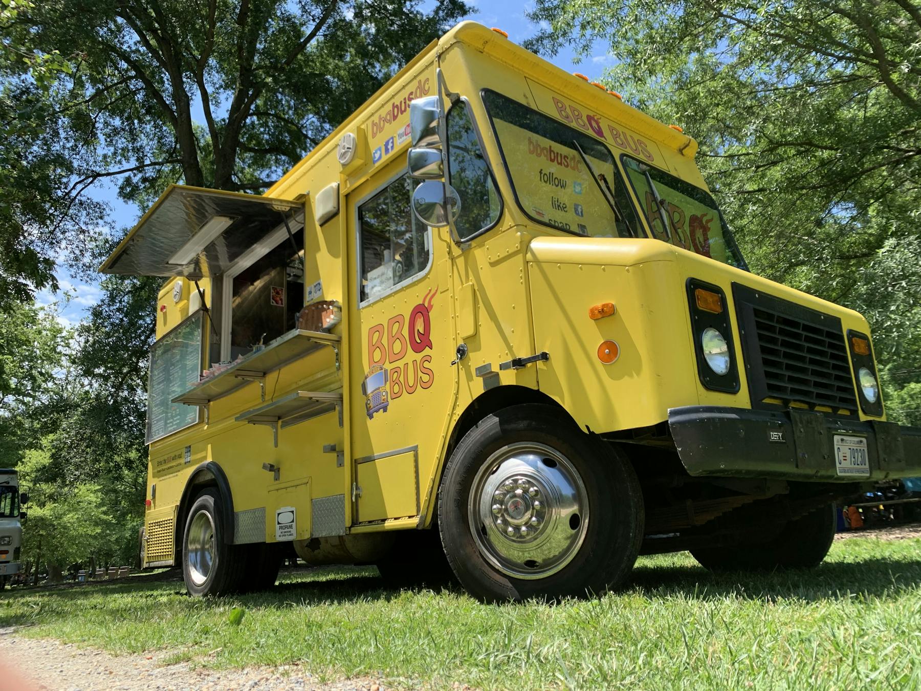 a truck is parked in the grass