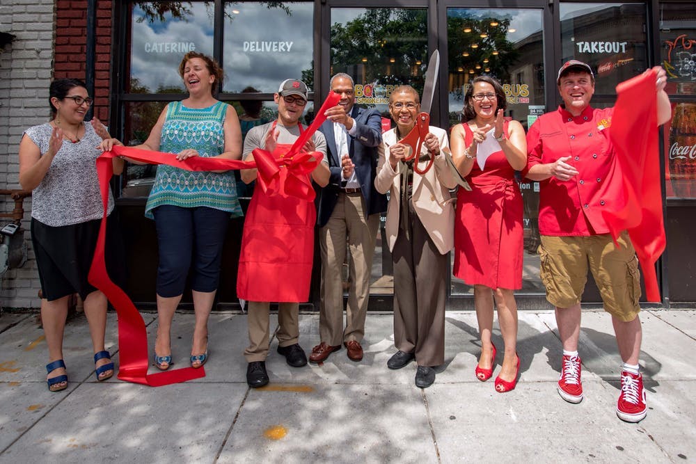 Eleanor Holmes Norton et al. standing in front of a crowd posing for the camera