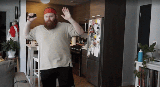 a man dancing in a room