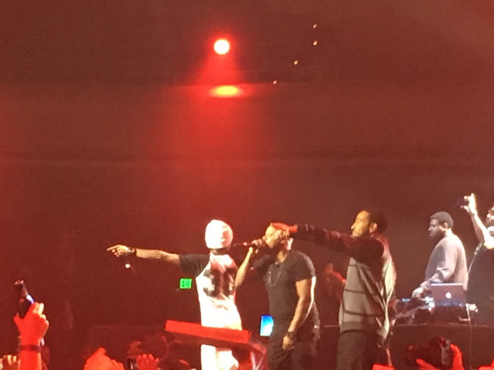 a group of people standing on a stage