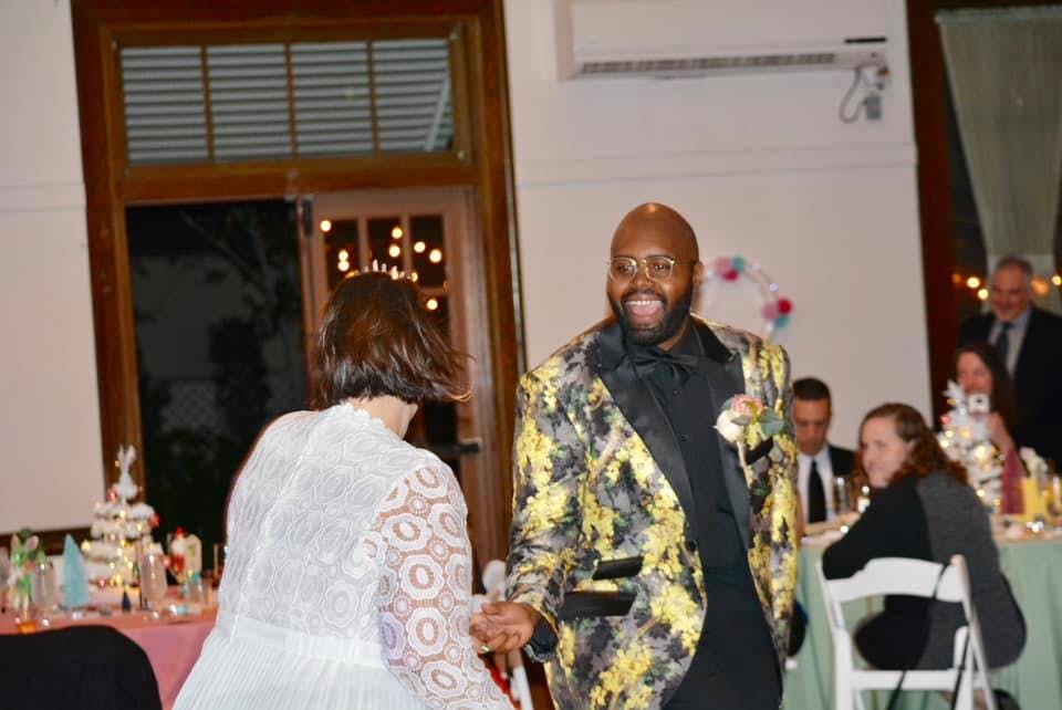 a group of people standing in a room