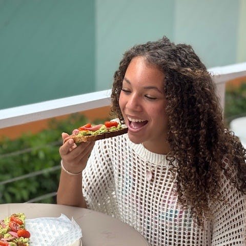 a woman swinging a golf club