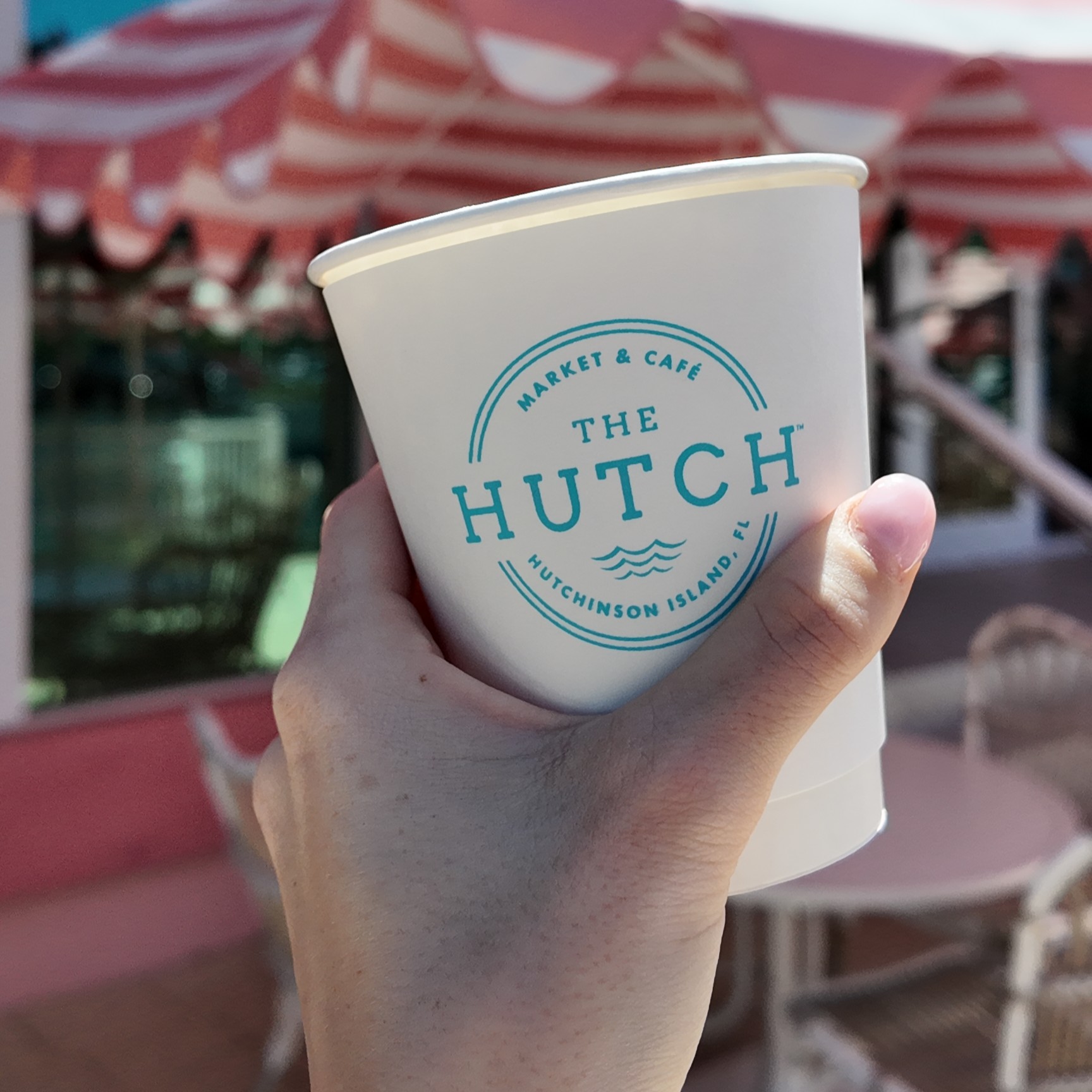 a glass of orange juice on a table