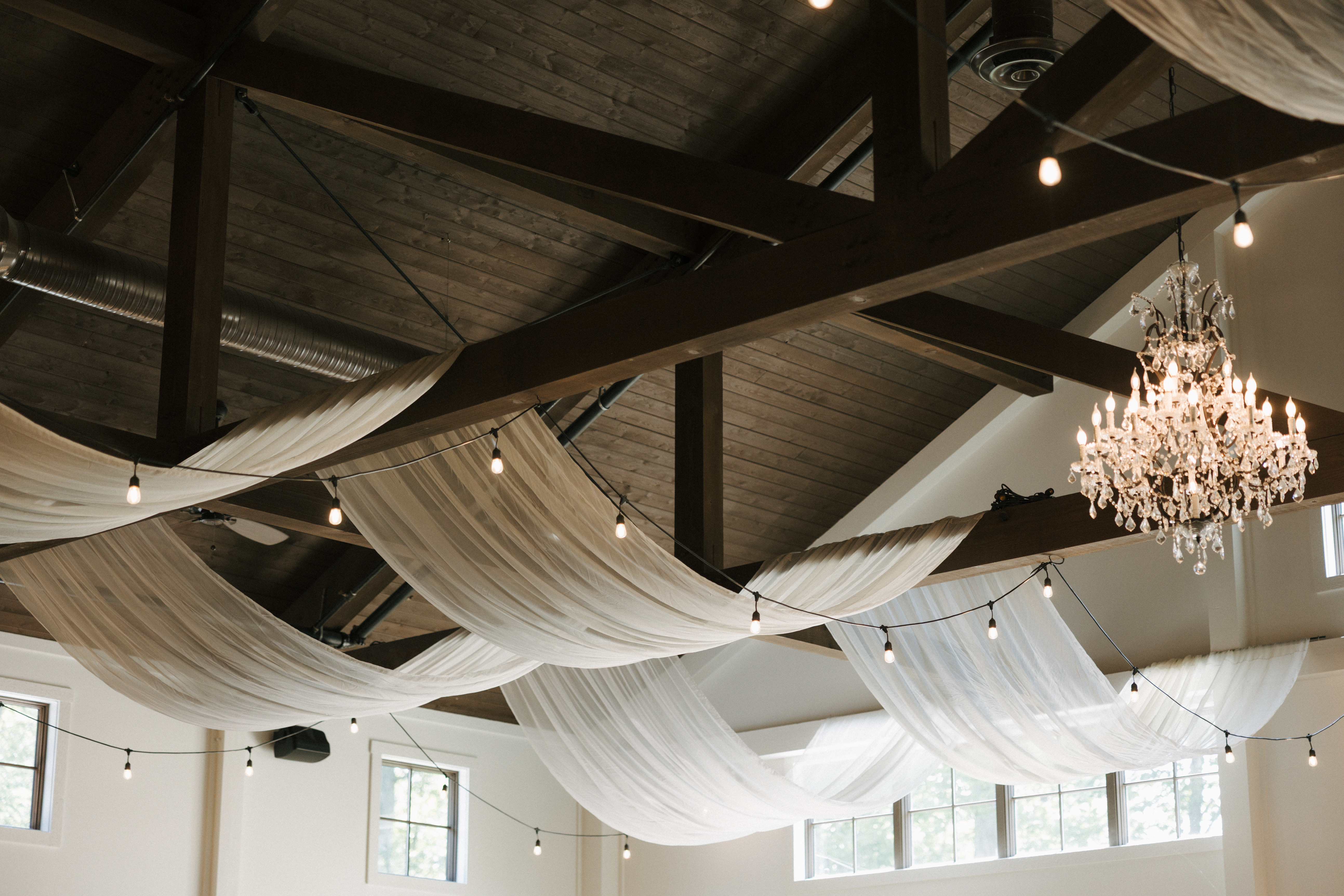 Bay Horse Inn event tent with draped ceiling and lights