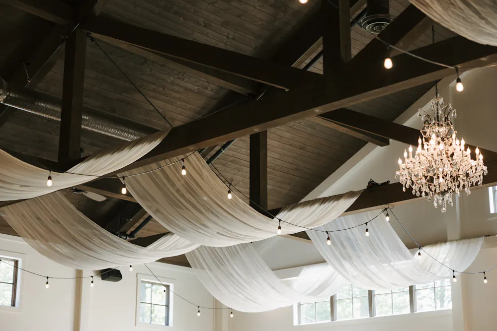 Bay Horse Inn event tent with draped ceiling and lights