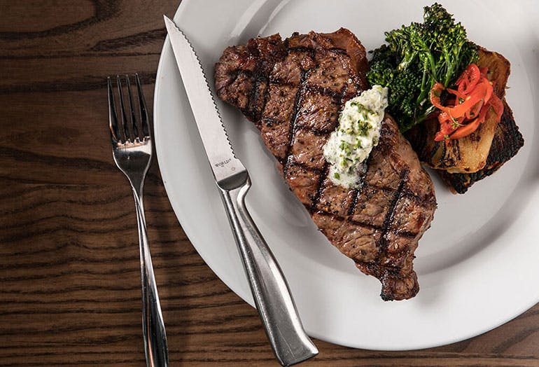 a plate of food with a fork and knife