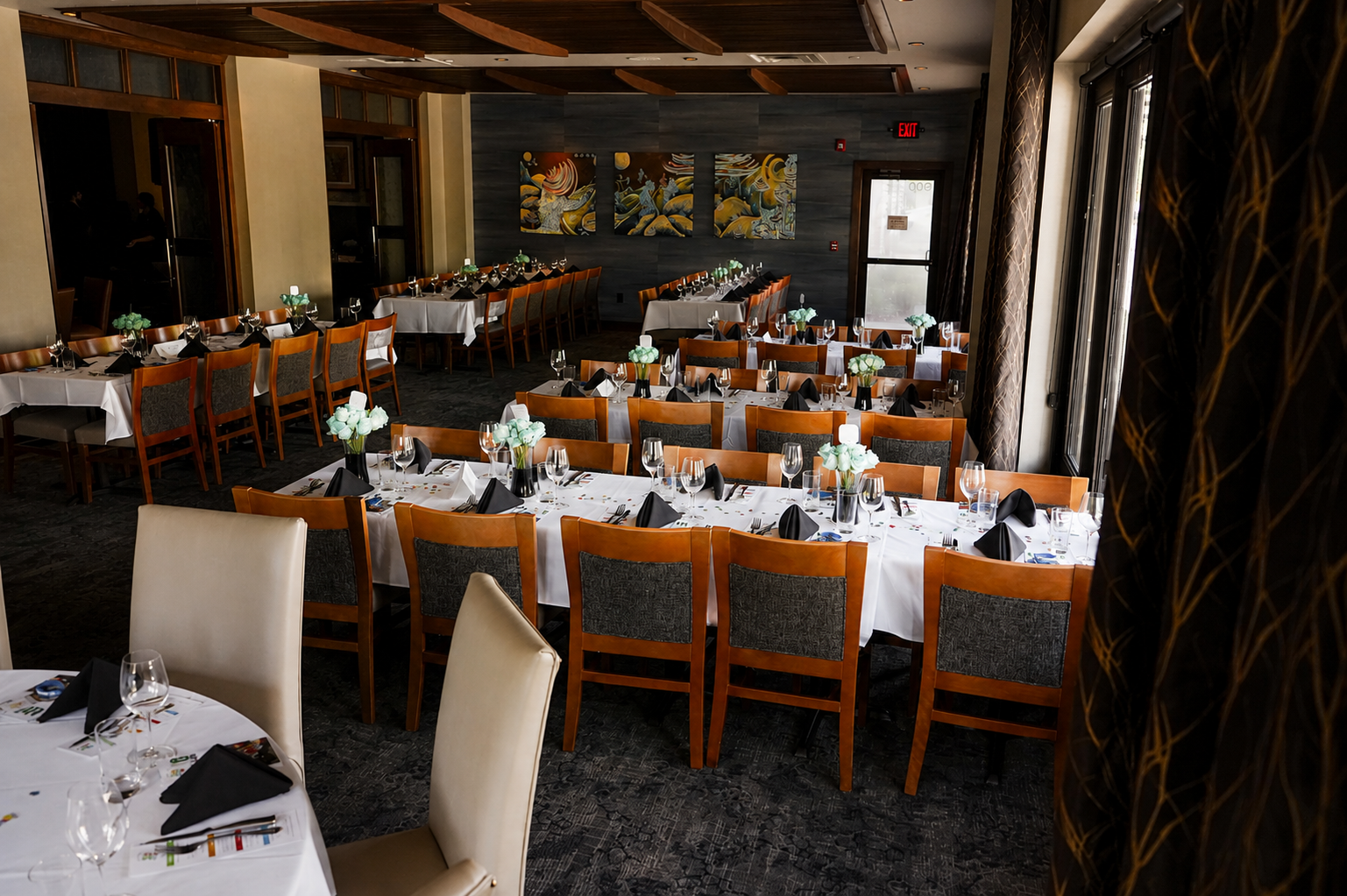 a room with tables and chairs
