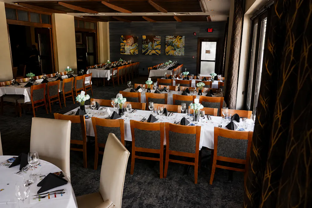 a room with tables and chairs
