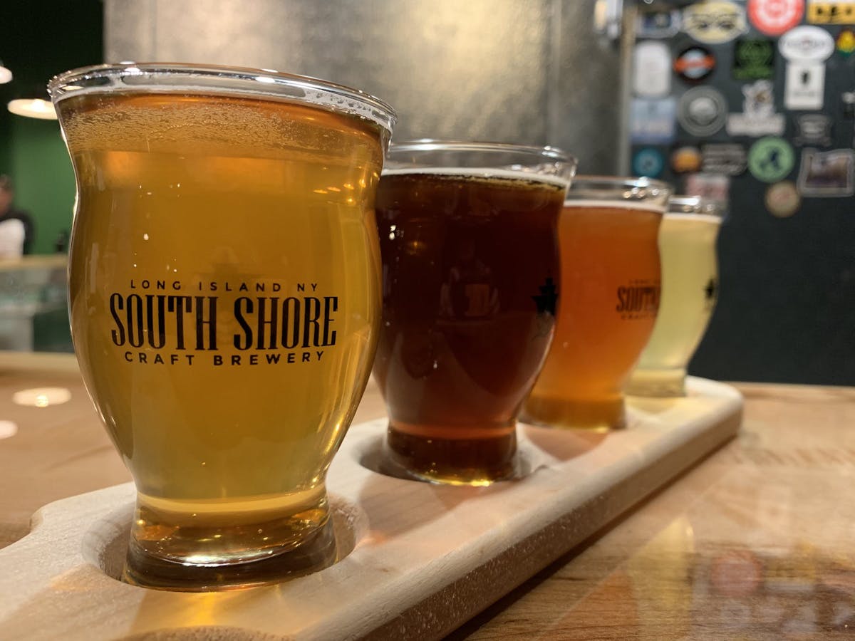 a glass of beer on a table